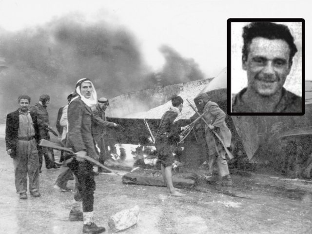 החלל יעקב זריהן הי"ד על רקע אחת המשאיות השרופות בדרך לירושלים