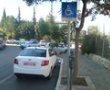 קצין משטרה שחנה בחניית נכים בעיר נקנס וקיבל דו"ח ממפקדיו